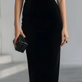 Vestido Midi de Terciopelo Negro con Lazo
