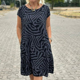 Vestido de Verano Nelia con Cuello Redondo y Estampado Bonito