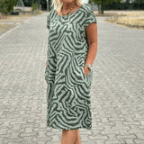 Vestido de Verano Nelia con Cuello Redondo y Estampado Bonito