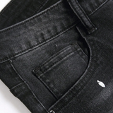 Pantalón de Mezclilla Desgastado Rebel